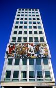 Travel photography:Building featuring mosaic with socialist theme at the Alexanderplatz, Germany