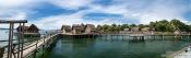 Travel photography:Panoramic view of the neolithic stilt houses at the open air museum in Uhldingen, Germany