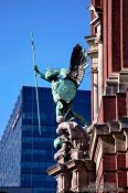 Travel photography:Archangel Michael above the portal of St. Michaelis church in Hamburg (Michel), Germany