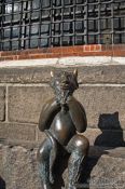Travel photography:Devil sculpture outside the Marienkirche (St. Mary`s church) in Lübeck, Germany