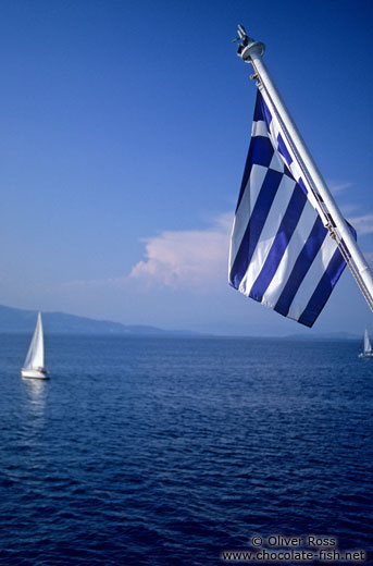 Greek flag with sailing boat