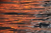 Travel photography:Sunset reflections in Igoumenitsa harbour, Greece