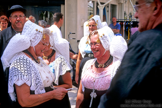 Men and women in traditional dress at a festival in Vlissingen