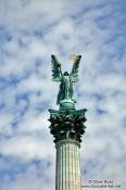 Travel photography:The archangel Gabriel atop the Millennium column on Budapest´s Heros´ Square, Hungary