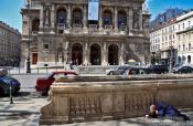 Travel photography:Budapest opera house with beggar , Hungary