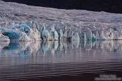 Travel photography:Edge of the Vatnajökull glacier calving into Breiðárlón lake, Iceland