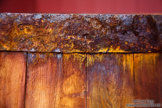 Detail of the rusty rim of a barrel outside the Siglufjörður herring museum