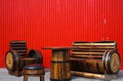 Travel photography:Table and chair ensemble from old herring barrels at a cafe in Siglufjörður, Iceland
