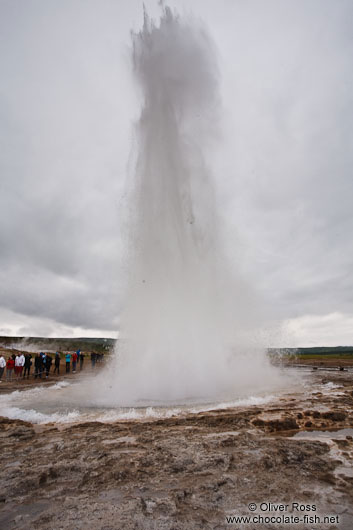 A geysir erupts at the Geysir Centre on the Golden Circle tourist route