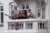 Travel photography:Live music performance in downtown Reykjavik performed on a balcony, Iceland