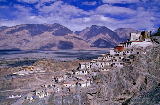 Diskit Gompa (buddhist monastery) with Chosling School in the background