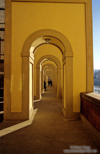 Walkway along the river in Florence