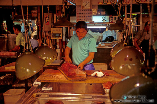 Cutting the catch of the day at the Tsukiji fishmarket in Tokyo