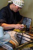 Travel photography:Preparing small biscuits in a street bakery in Kyoto´s Gion district, Japan