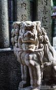 Travel photography:Stone dog sculpture at Kyoto´s Inari shrine, Japan