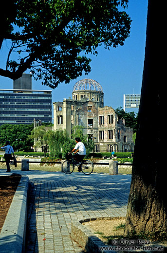 Cyclist in front of The Atomic Bomb Dome in Hiroshima