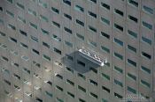 Travel photography:Window cleaners at a skyscraper in Tokyo´s Shinjuku district, Japan