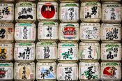 Travel photography:Painted sake barrels wrapped in straw at Tokyo´s Meiji shrine, Japan