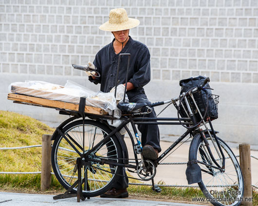 Man with bike in Seoul