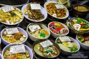 Travel photography:Food dishes for sale at a restaurant on the Seoul night market, South Korea