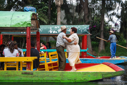 Dancing to the tune of the Mariachi on one of the colourful trajineras (rafts) on Lake Xochimilco