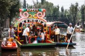 Travel photography:Colourful trajineras (rafts) on Lake Xochimilco, Mexico
