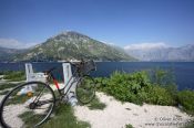 Travel photography:Bike overlooking Perast bay (Boka Kotorska), Montenegro