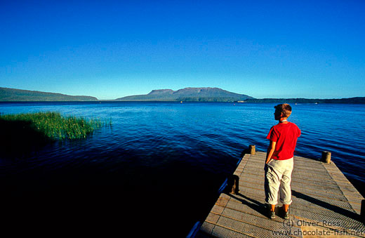 View of lake Tarawera with the dormant volcano of Mt Tarawera in the background