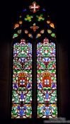Travel photography:Coloured window inside the Mosteiro da Batalha, Portugal