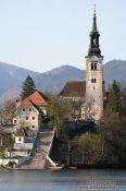 Travel photography:Island with church and staircase within Blejsko jezero (Bled lake), Slovenia