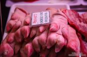 Travel photography:Pig´s feet for sale at the Bilbao food market, Spain