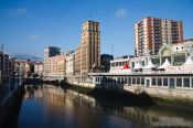 Travel photography:Houses along the Nervión river in Bilbao, Spain