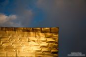 Travel photography:Evening light hits the facade of the Bilbao Guggenheim Museum, Spain