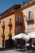Travel photography:Houses on the plaza mayor in Begur, Spain