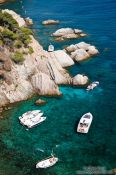 Travel photography:Boats in a small bay along the Costa Brava, Spain