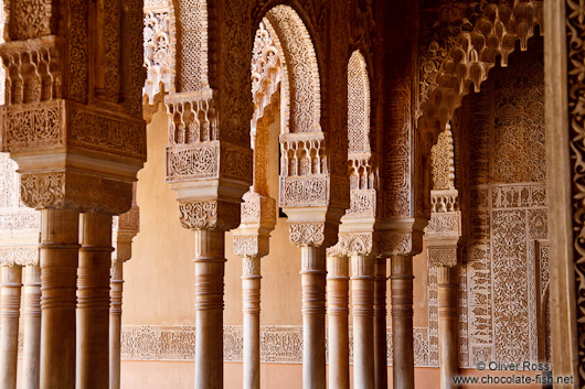 Arches in the Patio de los Leones (Court of the Lions) of the Nazrin palace in the Granada Alhambra