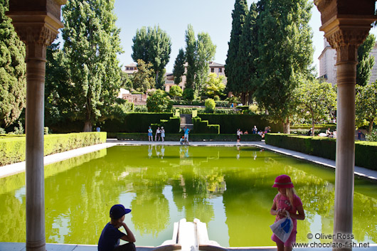 Portico and pool of the early 14th-century Partal, in the Alta Alhambra in Granada