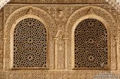 Travel photography:Ornate arabesque windows in the Nazrin palace of the Granada Alhambra, Spain