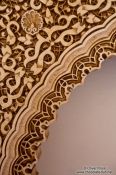 Travel photography:Arabesque facade detail in the Nazrin palace in the Granada Alhambra, Spain