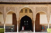 Travel photography:Arches in the patio de los Arrayanes (Court of the Myrtles), also called the Patio de la Alberca (Court of the Blessing or Court of the Pond) in the Nazrin palace of the Granada Alhambra, Spain