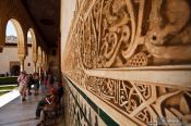 Travel photography:Facade detail in the Patio de los Arrayanes (Court of the Myrtles), also called the Patio de la Alberca (Court of the Blessing or Court of the Pond) in the Nazrin palace of the Granada Alhambra, Spain