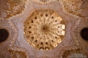 Travel photography:Arabesque ceiling in the Sala de los Abencerrajes (Hall of the Abencerrages) of the Nazrin palace in the Granada Alhambra, Spain