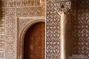 Travel photography:Facade detail with door in the Nazrin palace in the Granada Alhambra, Spain
