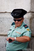 Travel photography:Bored policeman in Madrid, Spain