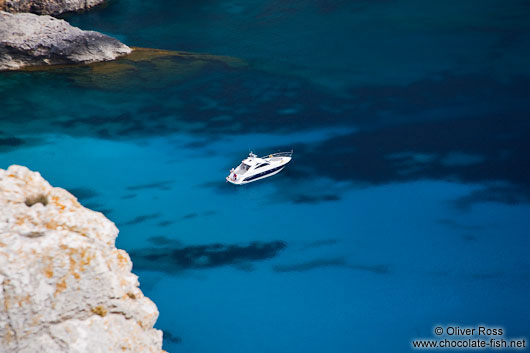 Anchored boat in a bay near Cap Formentor
