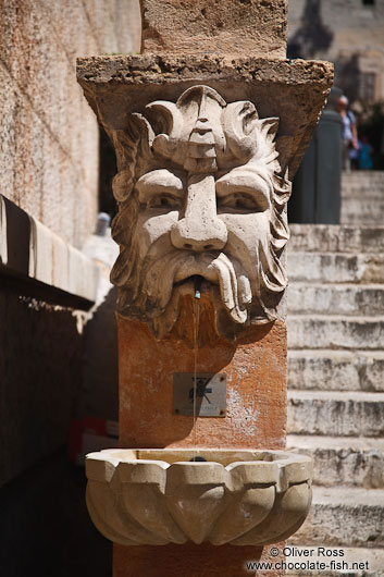 Sculpted stone fountain in Palma