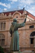 Travel photography:Statue of Juniper Serra outside the Basilica St Francesc in Palma, Spain