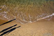 Travel photography:Shadows in la Concha beach in San Sebastian, Spain