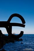 Travel photography:Peine del viento sculptures by Eduardo Chillida at the foot of the Igeldo mountain in San Sebastian, Spain