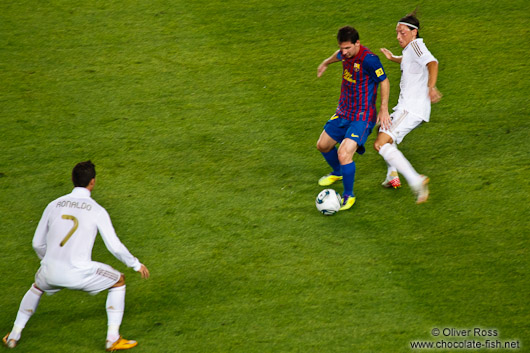 Tackle by Özil against Messi with Cristiano Ronaldo